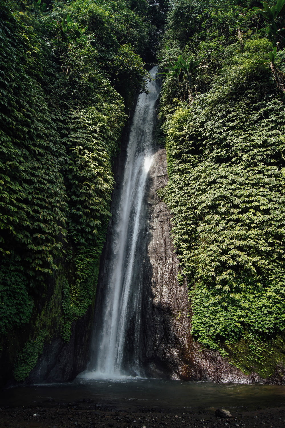 waterfalls through cliff