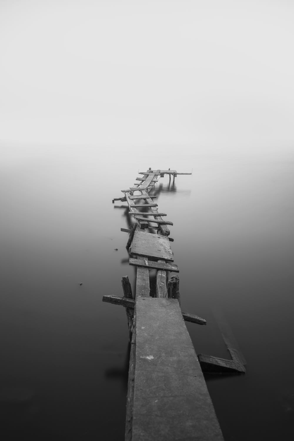 grayscale photo of dock