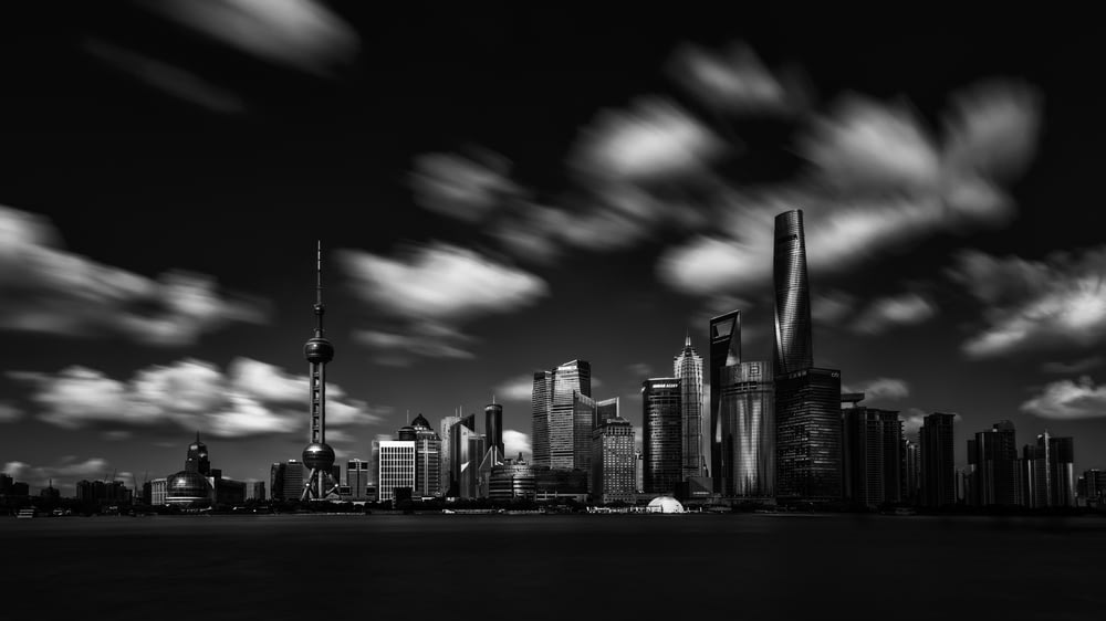 gray scale photography Oriental Pearl Tower and buildings
