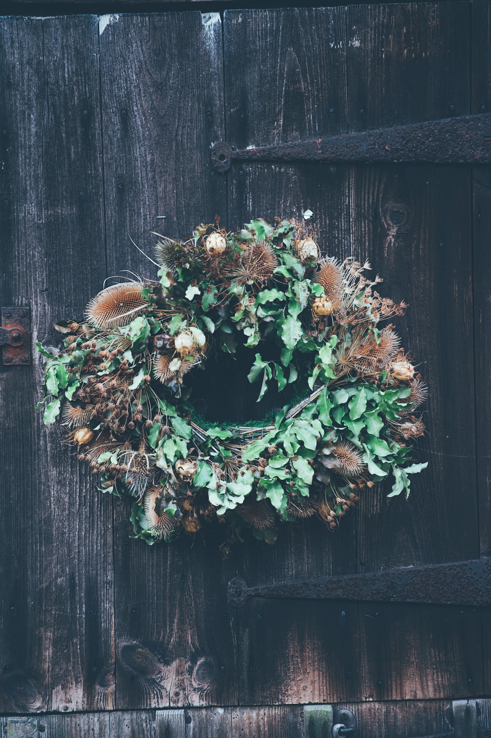 hanging green and brown floral wreath