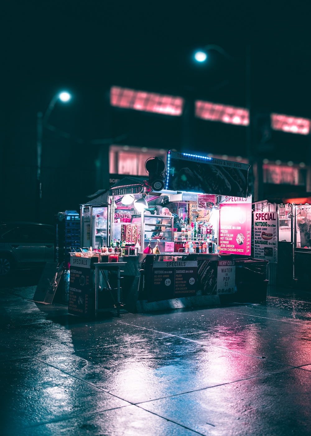 black and gray food stand during nighttime