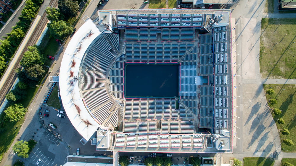aerial photography of grey concrete stadium