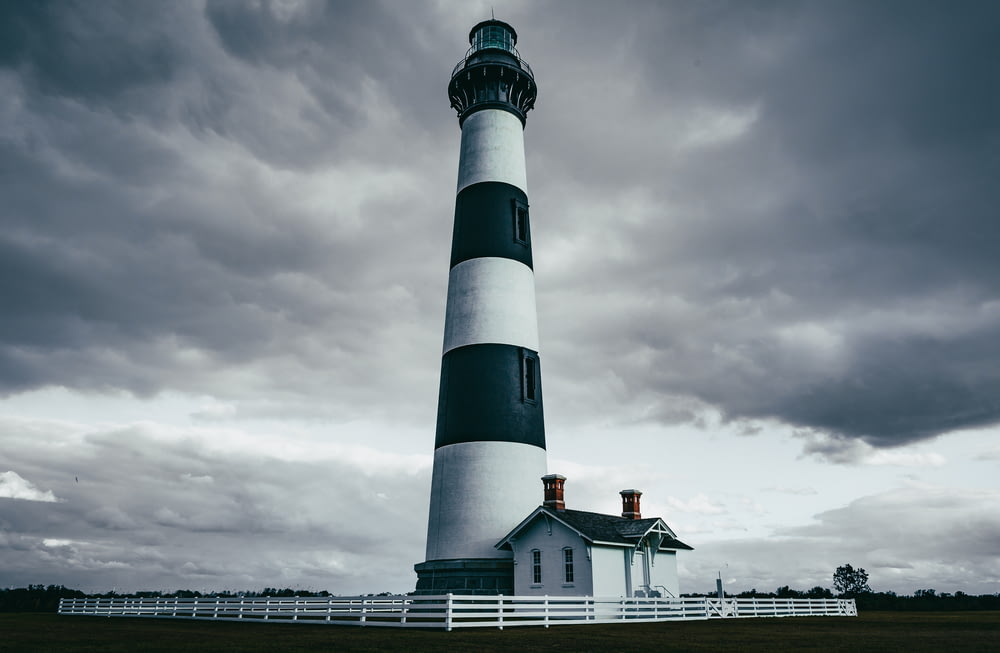 grayscale photography of light house