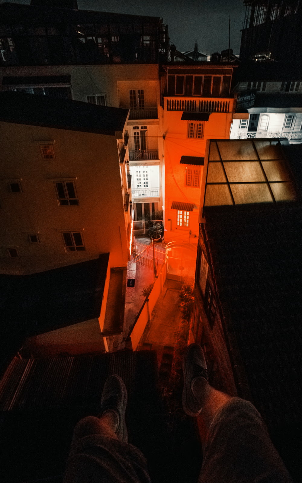 a person standing on a roof at night