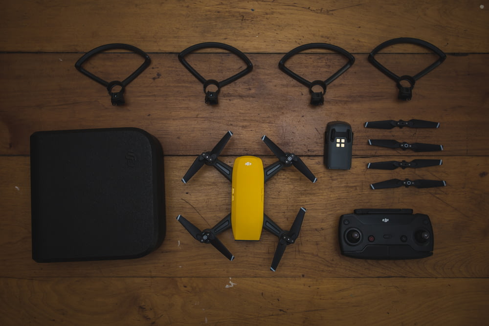 yellow DJI quadcopter set