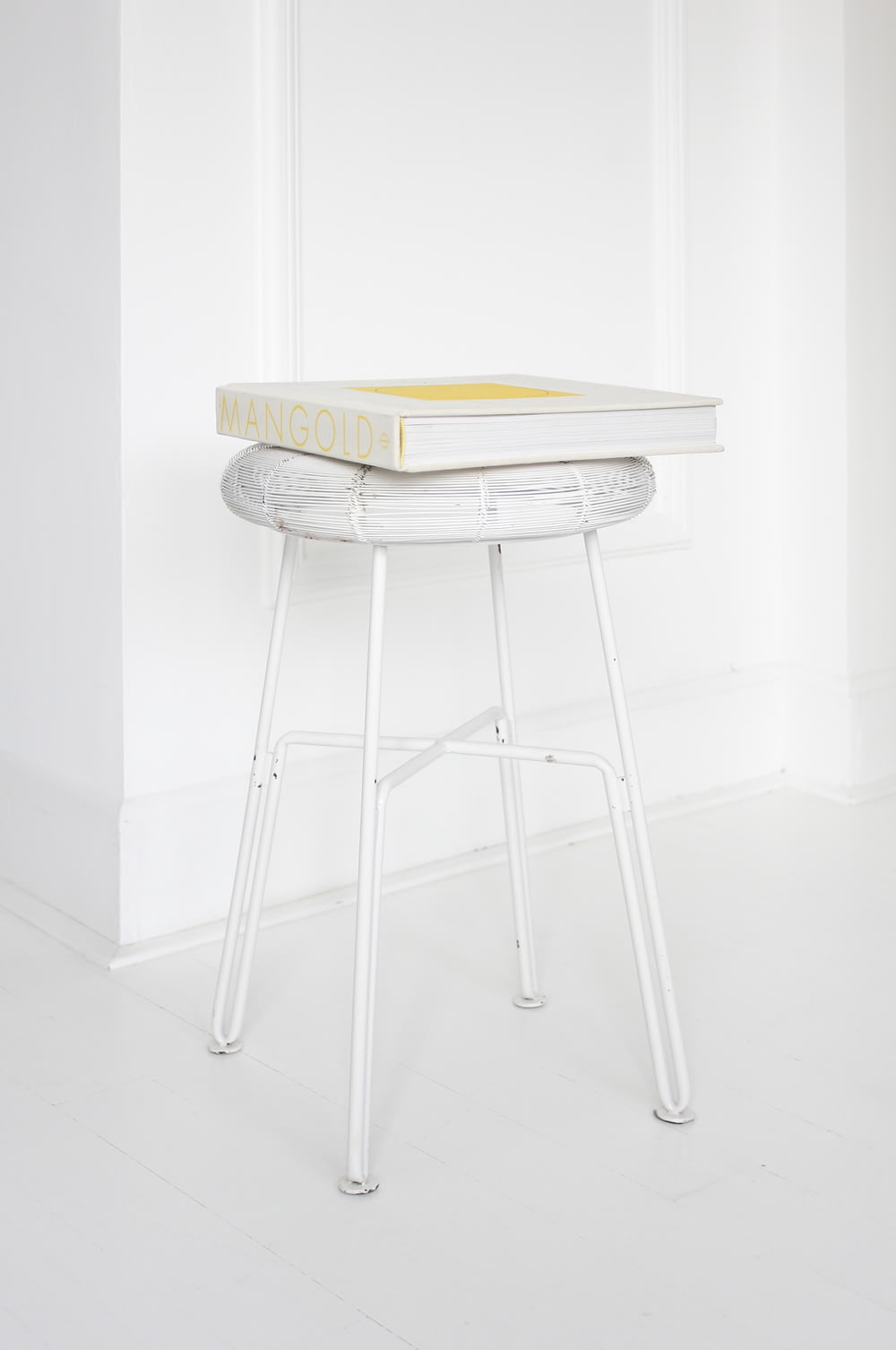 Mangold box on white stool