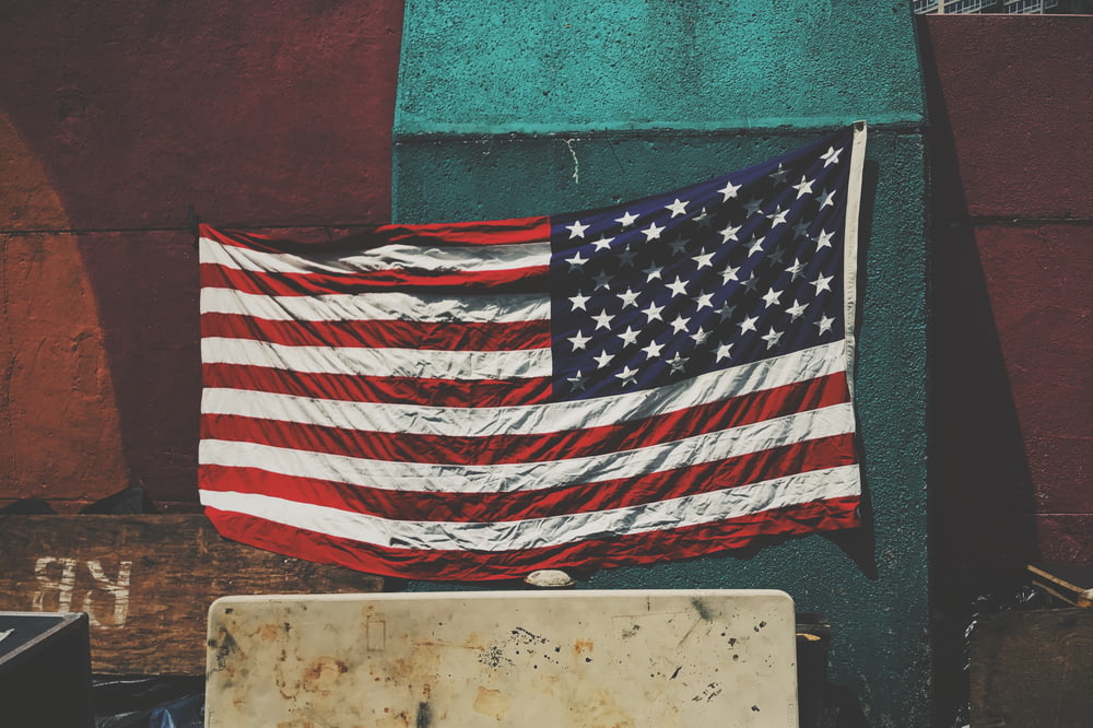 U.S. America flag on green board