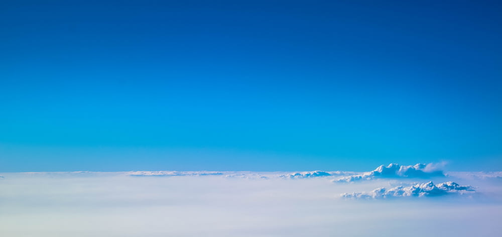 a view of the clouds from a plane window