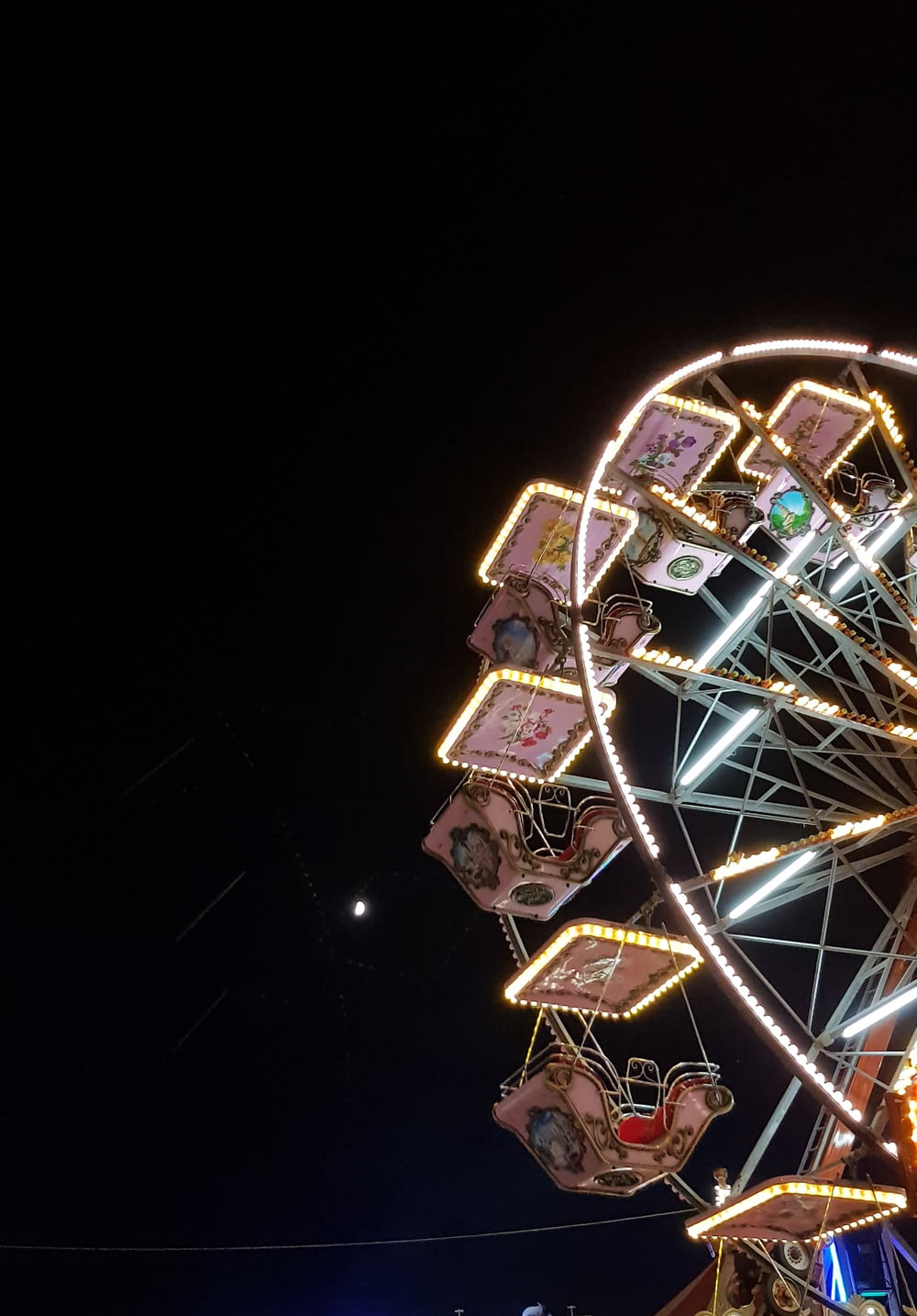 lit ferris wheel during night