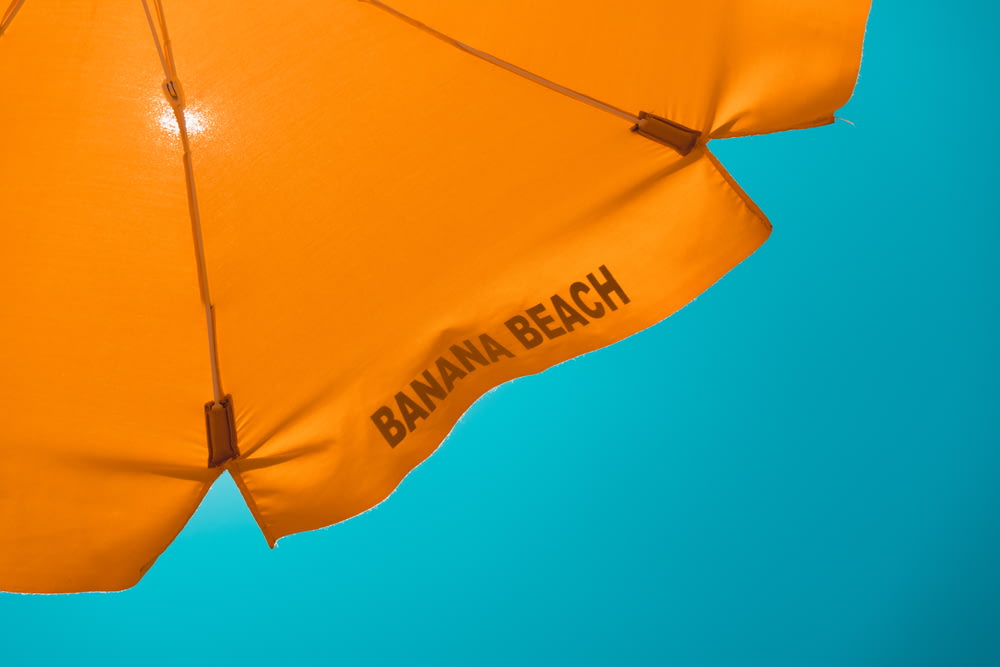 laranja banana praia guarda-chuva impresso