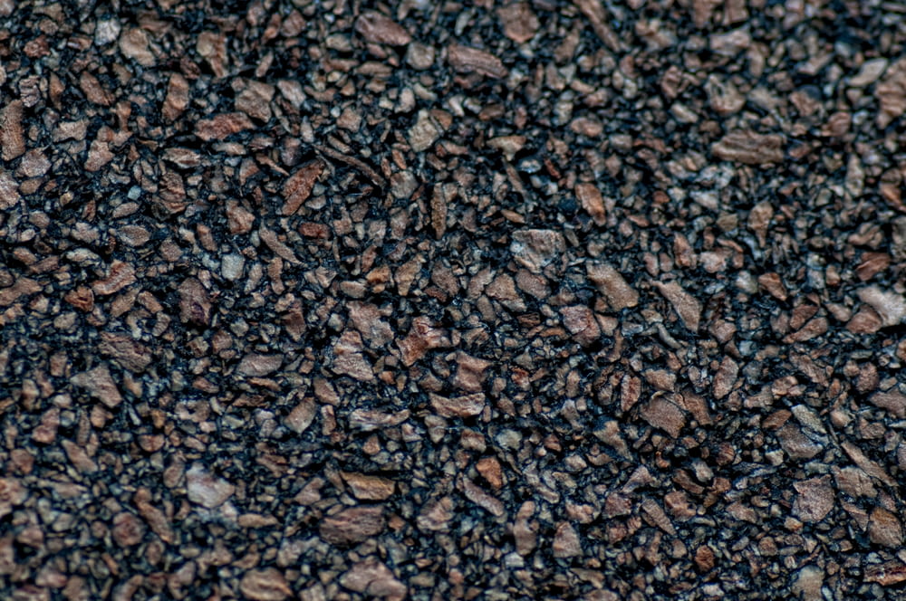 a close up of a black and brown textured surface