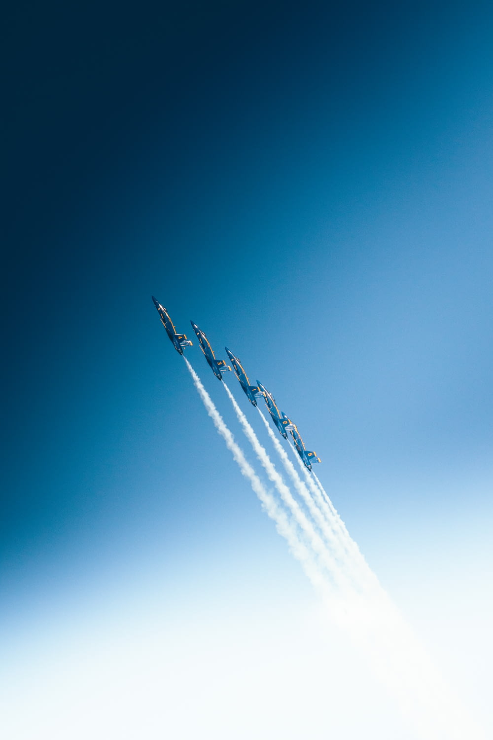 five jet flying in sky