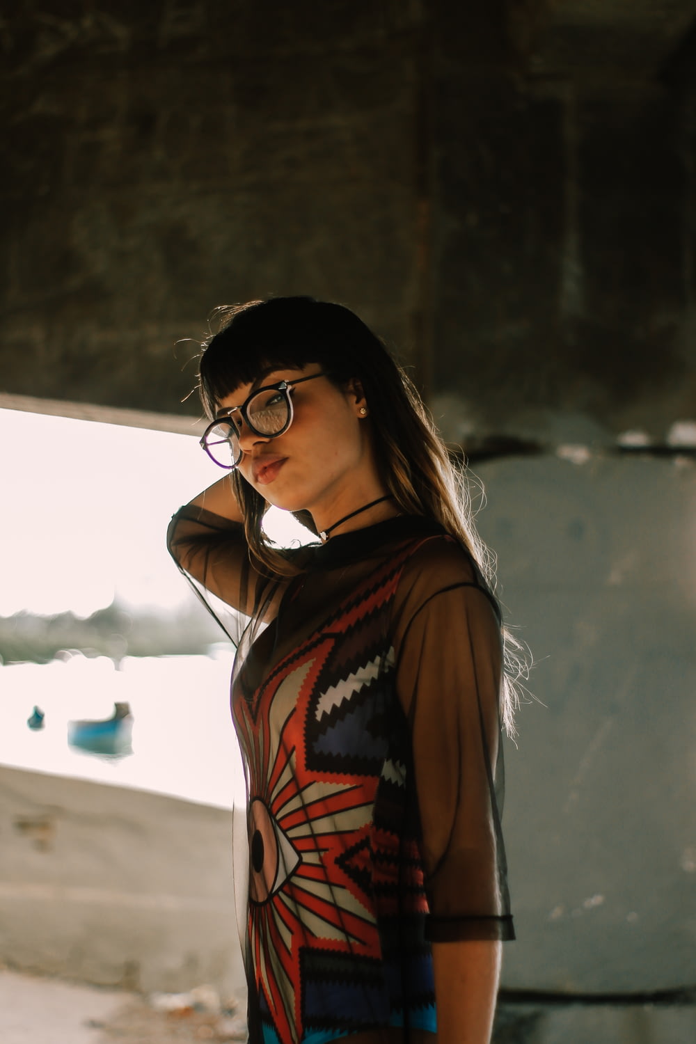 selective focus photography of woman wearing eyeglasses