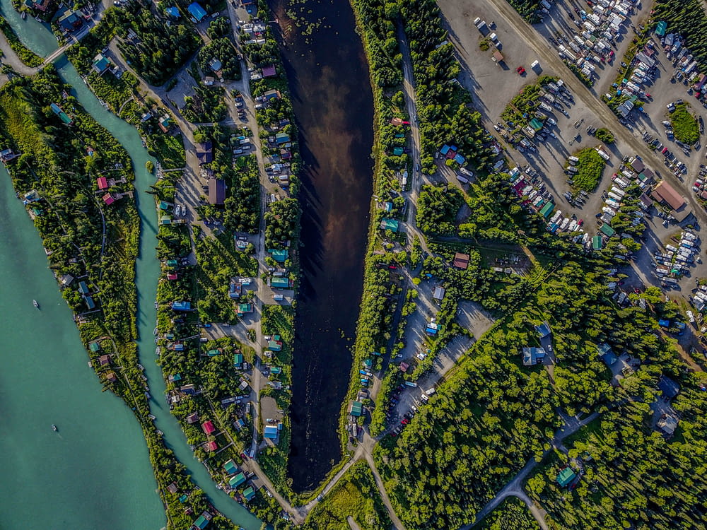 aerial photography of body of water and houses