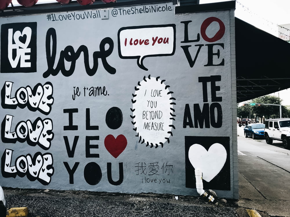 white wall with love graffiti