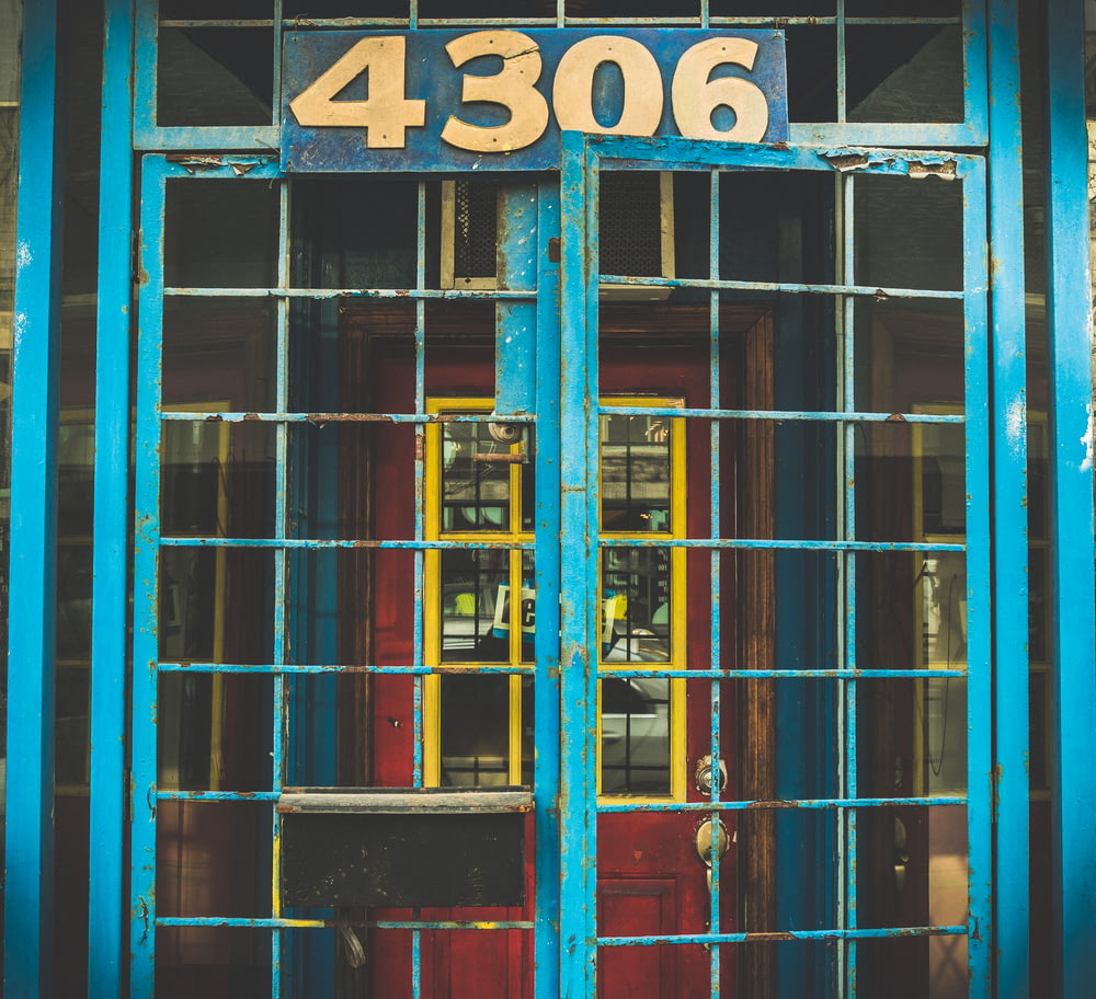 a blue door with a number on it