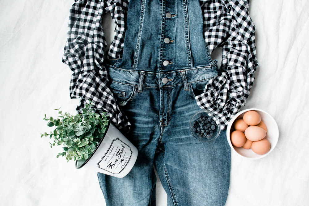 flat lay photography of clothes, eggs, and flowers