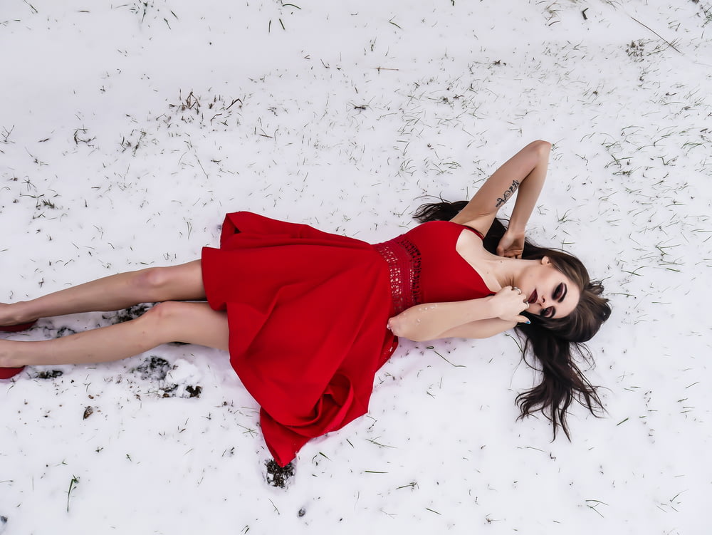 woman lying on snow