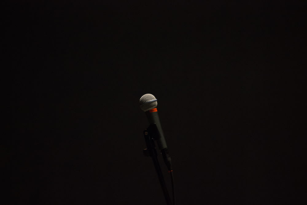black corded microphone with stand