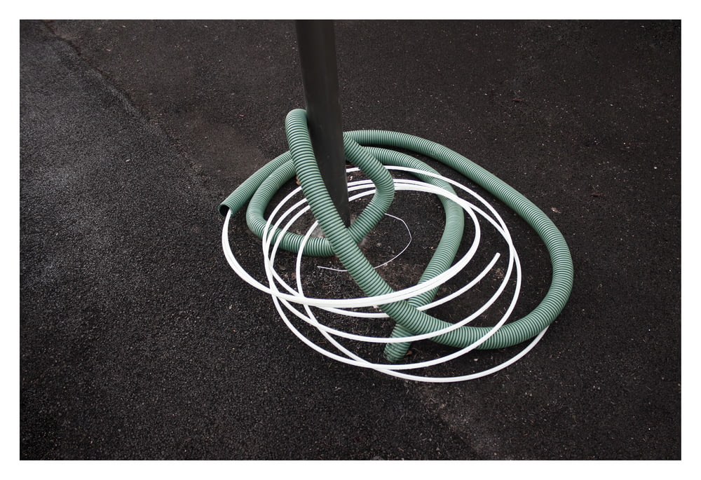 green and white coated cables