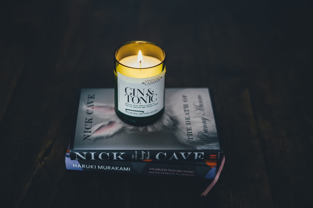 Gin & Tonic candle on Nick in the Cave book