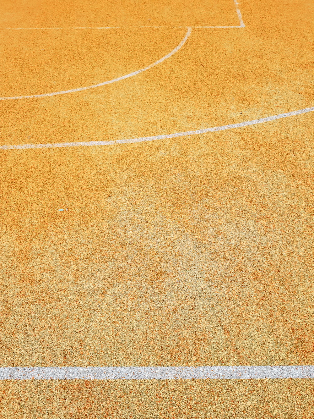 a basketball court with a white line on it