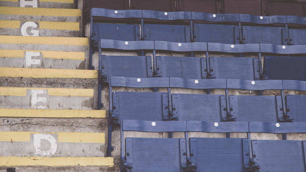 empty blue stadium chairs
