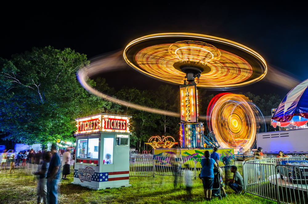 time-lapsed photography of amusement park rides