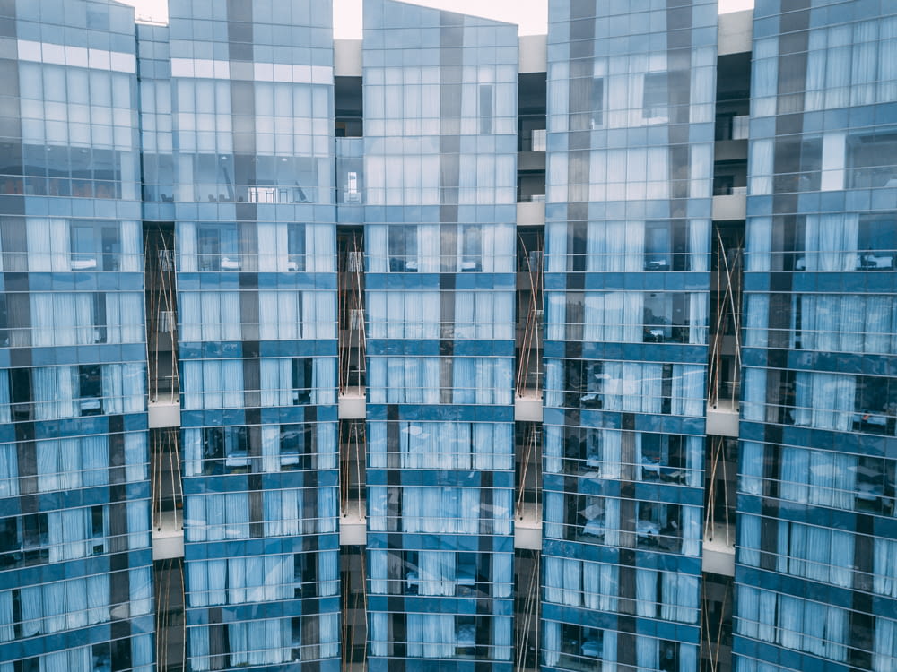 white and blue glass building