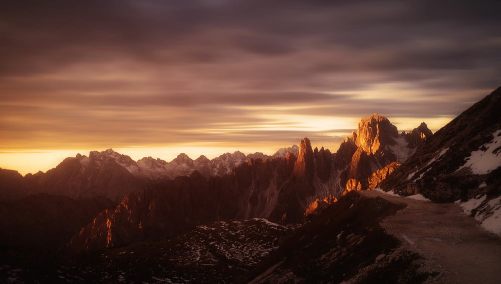 landscape photo of mountain range during golden hour