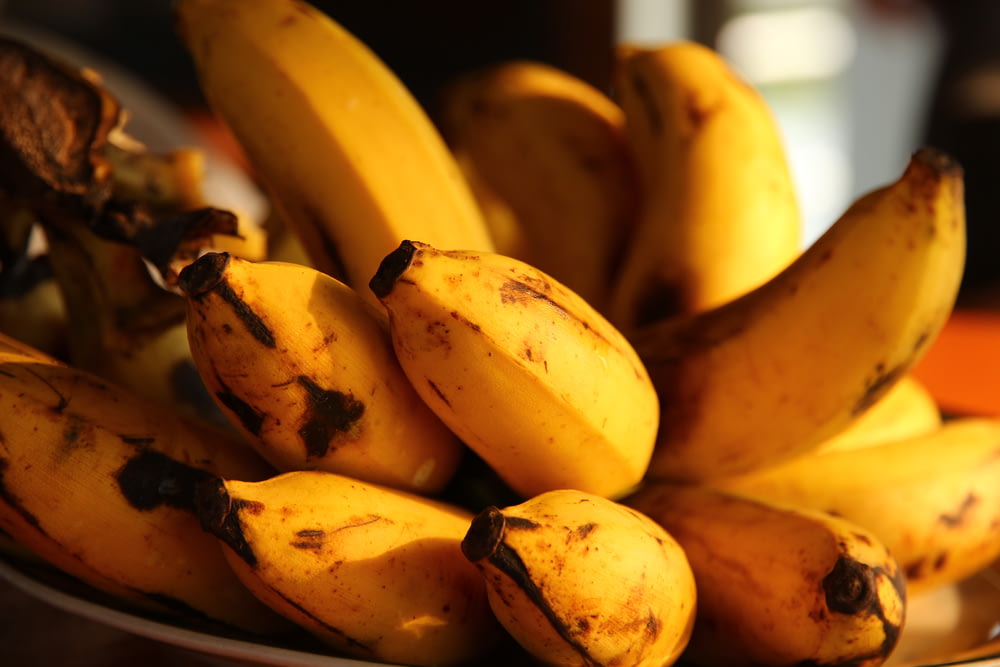 selective focus photography of ripped bananas
