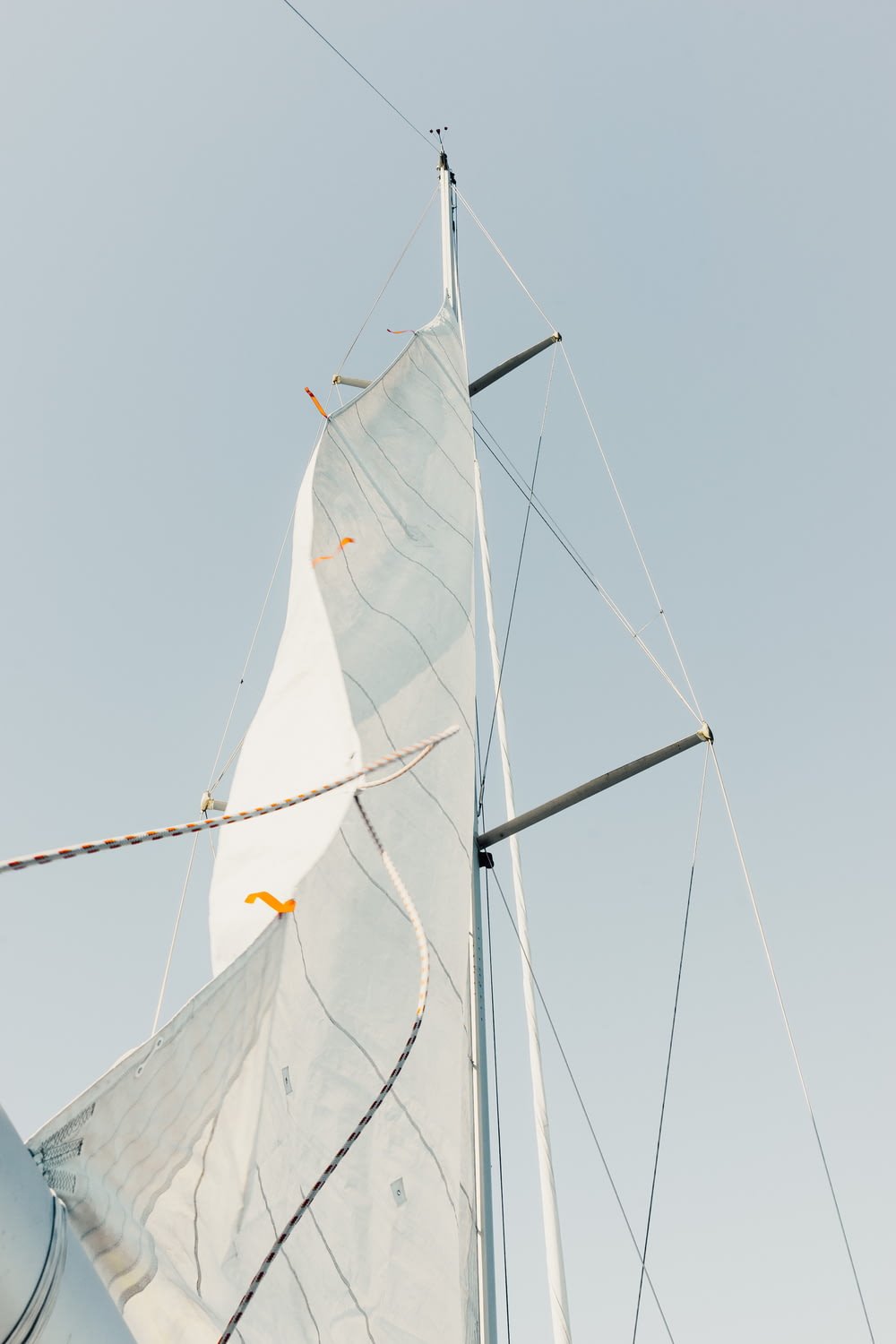 low angle photo of white sail