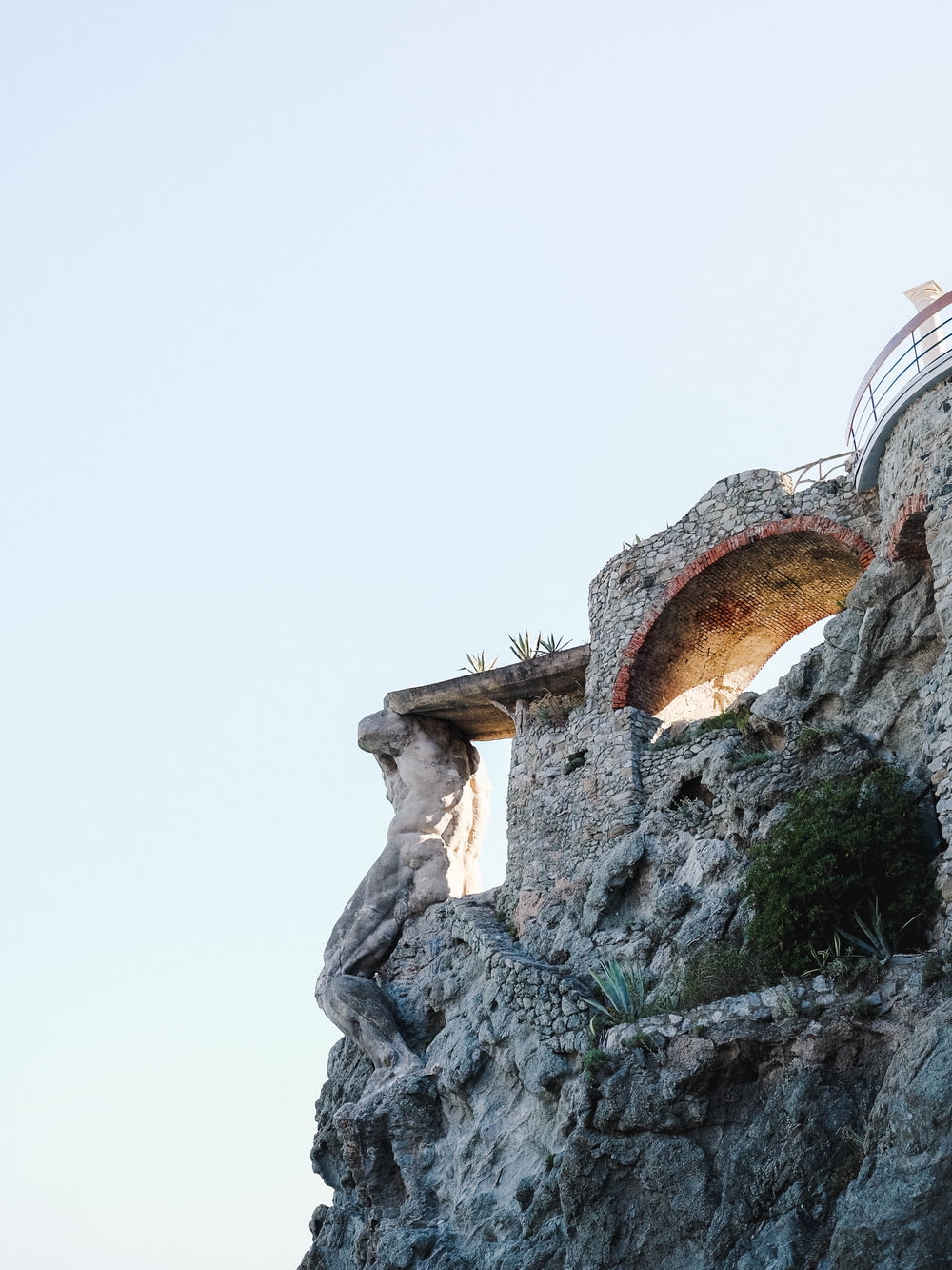 stone structure near cliff