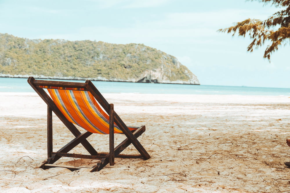 photo of lounge chair on beach