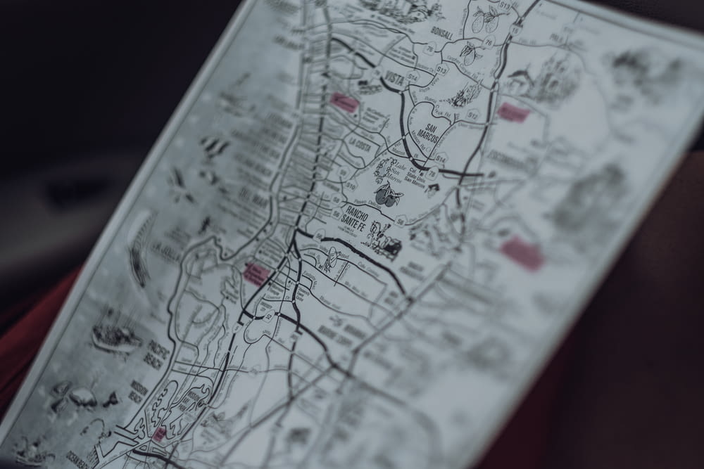 selective focus photo of map