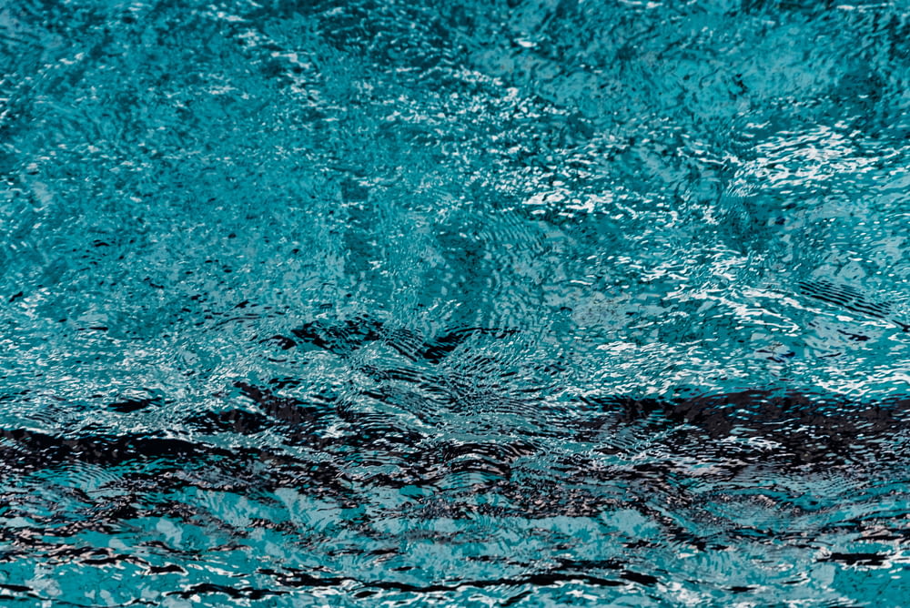 a close up of a blue water surface