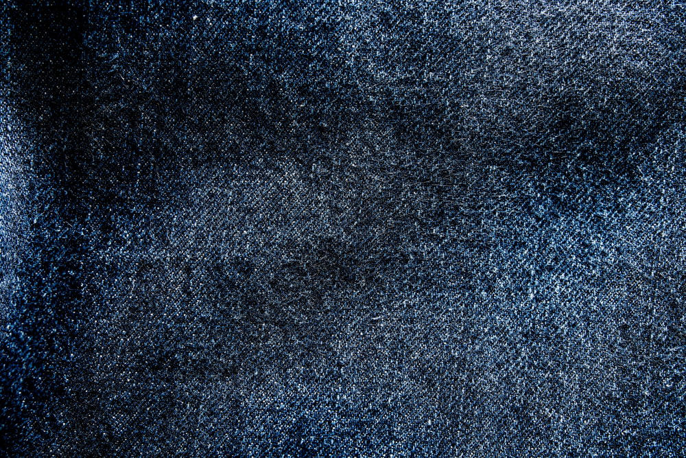 a close up of a blue area rug
