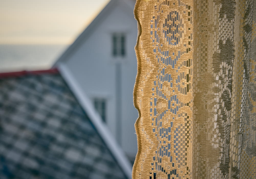 brown floral lace textile