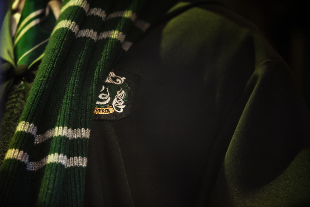 close photo of green and white scarf