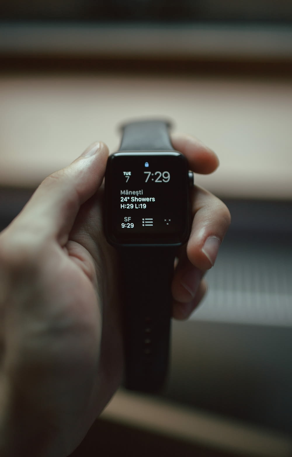 selective focus photography of space black aluminum case Apple Watch displaying 7:29