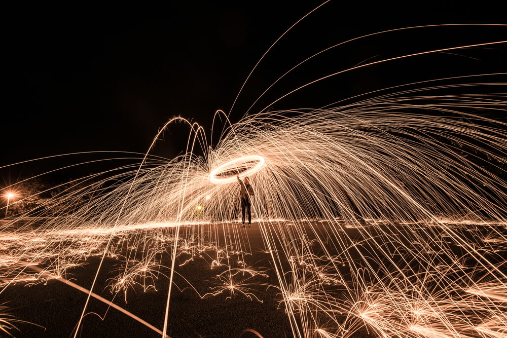 panning photography of fire dancers