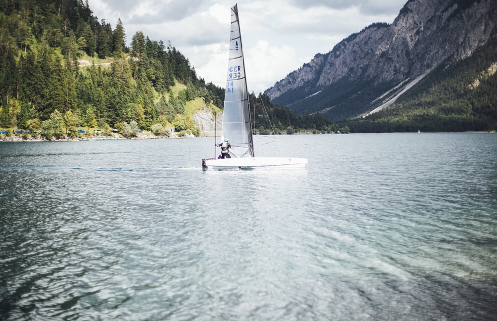 white sailboat on body of water