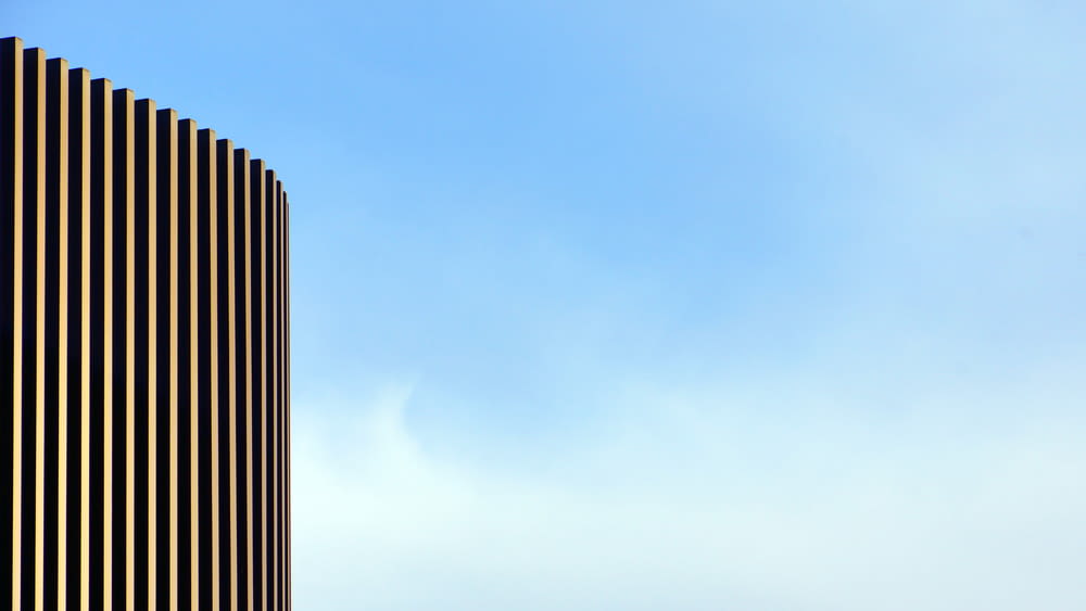 beige building under blue sky during daytime