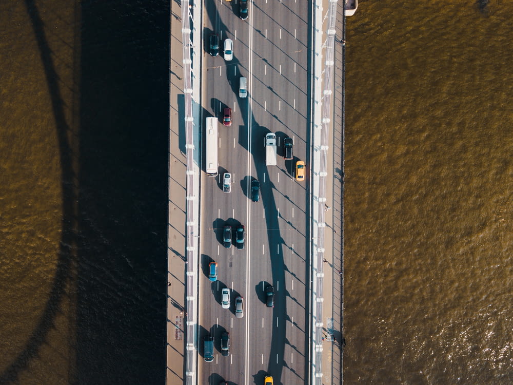 aerial view of bridge with cars