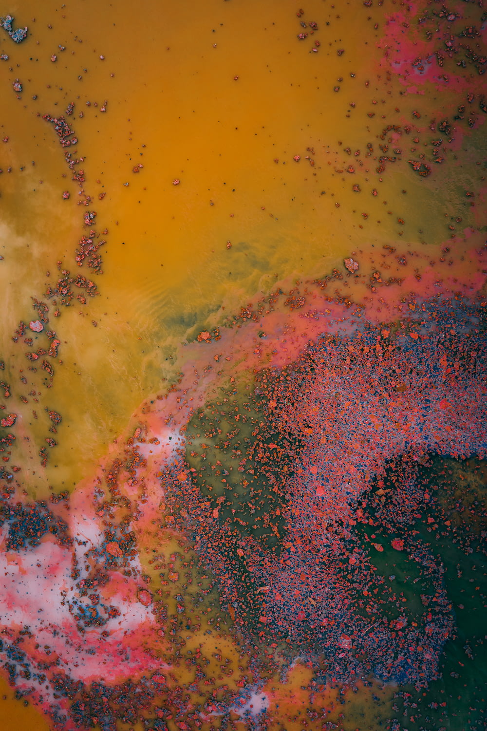 a close up of a yellow and pink substance