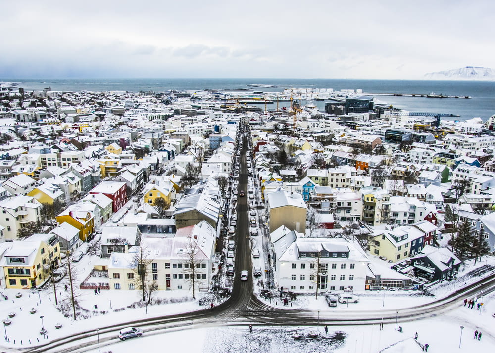 aerial photography of city surrounded with snow