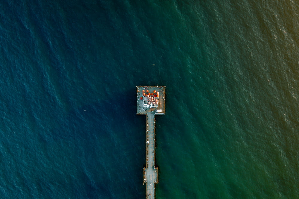 aerial photo of dock above body of water