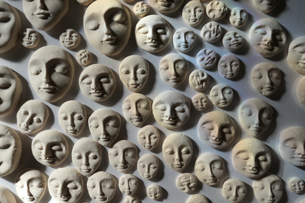 embossed face wall decor
