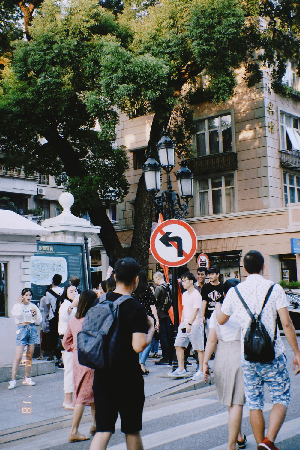urban photo of a street with crowd