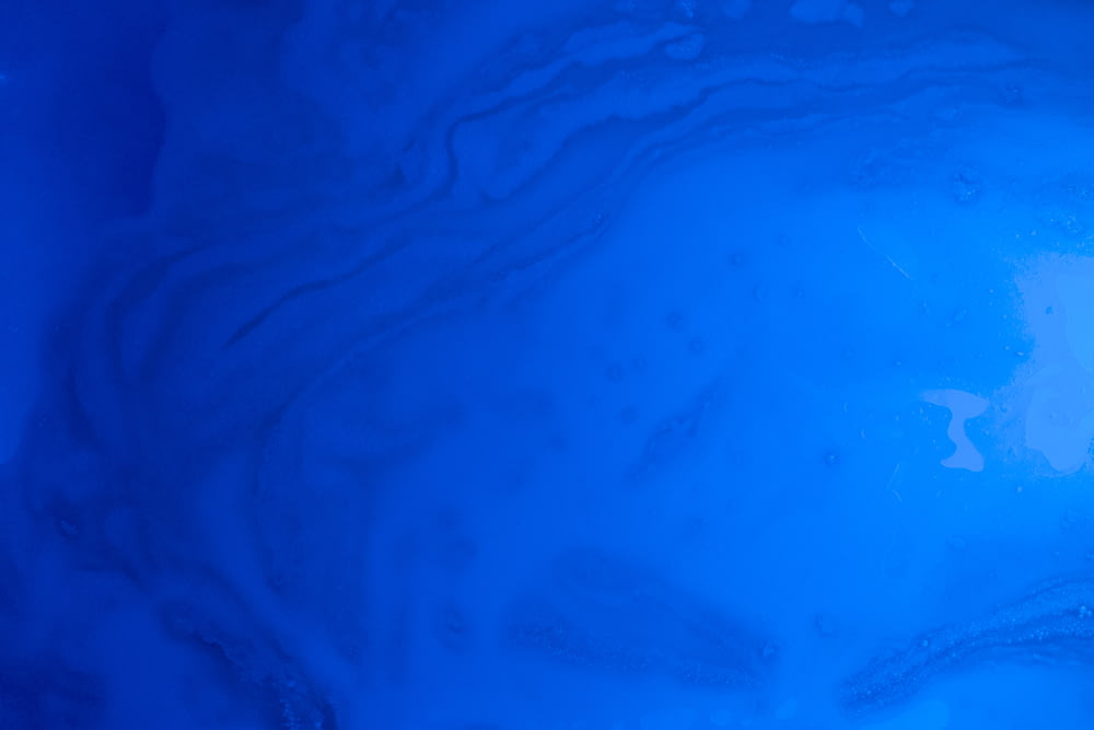 a close up view of a blue liquid